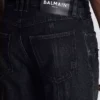 Biker jeans in black vintage denim Biker jeans in black vintage denim