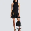 Flared grain de poudre dress with belt detail Flared grain de poudre dress with belt detail