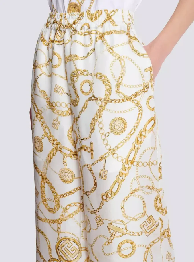 Flowing printed silk trousers with Balmain Chains pattern