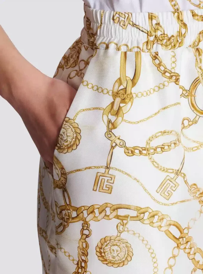 Flowing printed silk trousers with Balmain Chains pattern