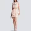 High-waist buttoned tweed mini skirt High-waist buttoned tweed mini skirt