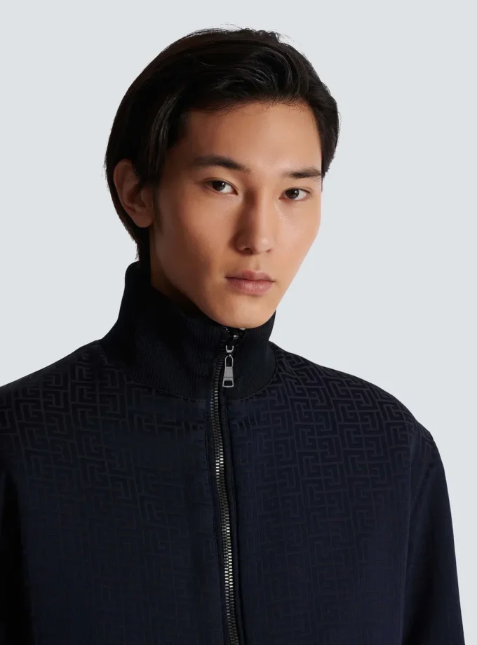 Reversible monogrammed bomber jacket