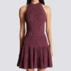 Sleeveless flared dress in openwork knit