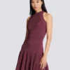 Sleeveless flared dress in openwork knit