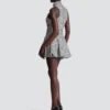 Sleeveless flared tweed dress